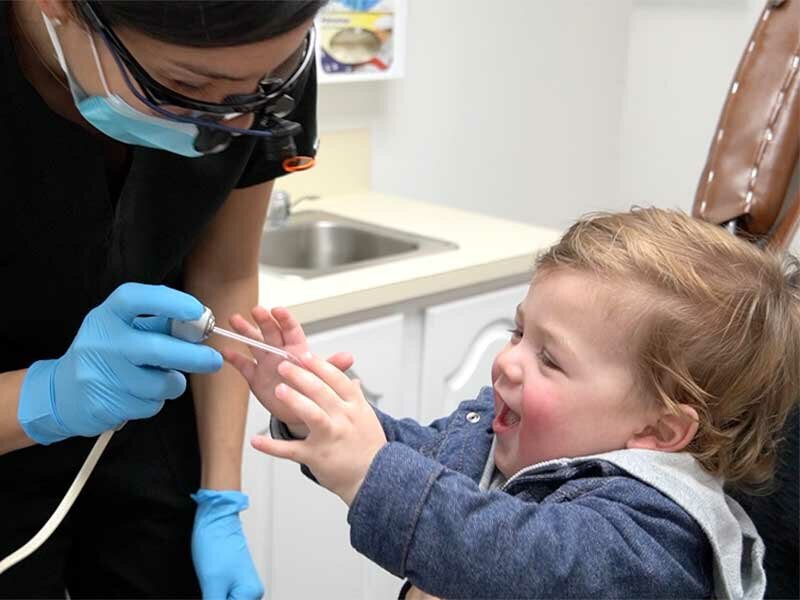 Infant seeing Birmingham dentist for kids